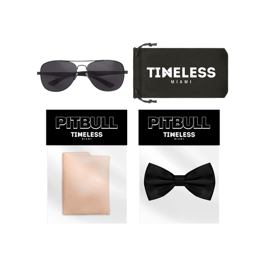 Sunglasses, black bow tie, and neutral tone bald cap 'Timeless Miami' and 'Pitbull' branding. 