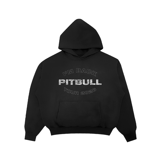 A black pullover hoodie with a front kangaroo pocket and a distressed white graphic print on the chest that reads 'I'M BACK PITBULL TOUR 2026'.